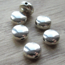 Plat rond kraaltje metaal