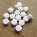 Plat rond wit acryl kraaltje