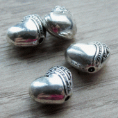 Metalen kraal bol hartje