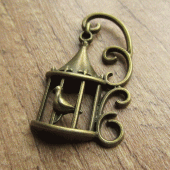 Bedeltje victoriaans vogelhuisje brons