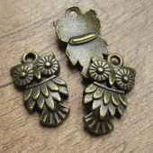 Bedeltje uiltje brons